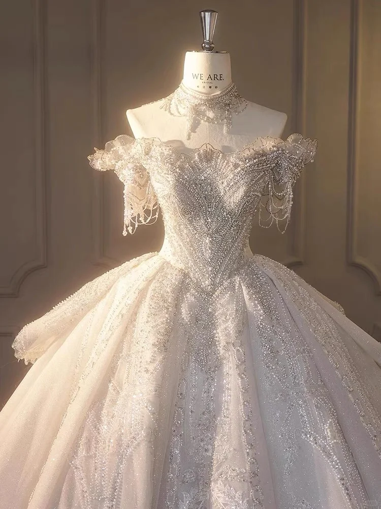 Timeless Ball Gown Off The Shoulder Tulle Sequin Beaded Long Wedding Dresses