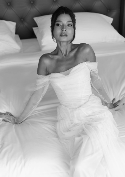 Elegant White Off-the-Shoulder Ruched Tulle Train Wedding Dress