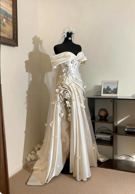 Elegant Ivory Off-the-Shoulder 3D Floral Satin Long Wedding Dress
